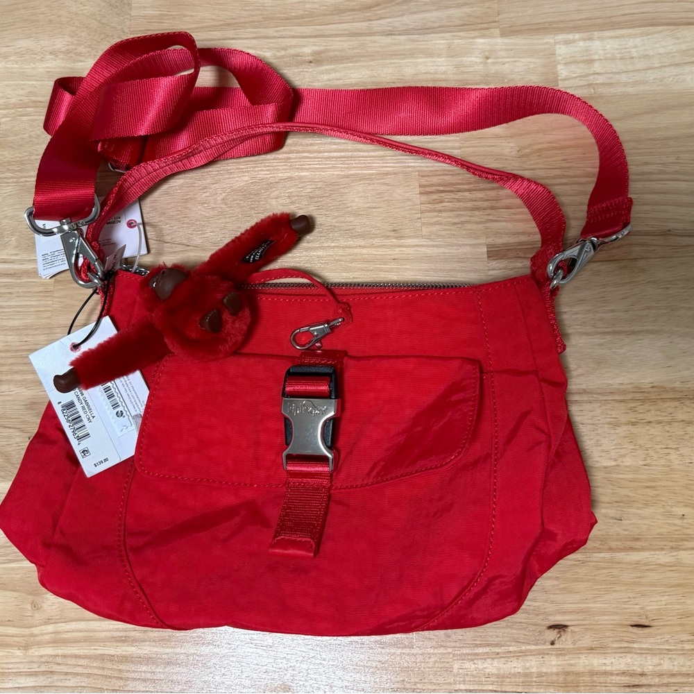 Kipling Red Crossbody Bag with Adjustable Strap and Silver Hardware